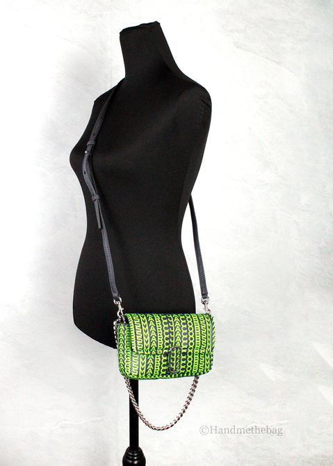Neon green mini shoulder bag with J Marc monogram, silver chain strap, flap closure.