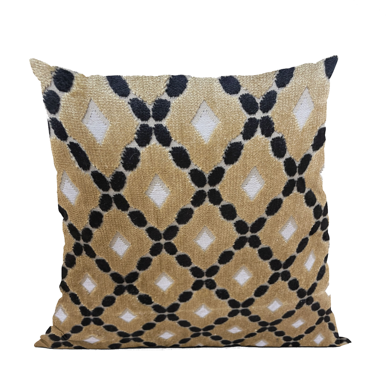 Square geometric velvet decorative pillow in cream and gold with black trellis lattice