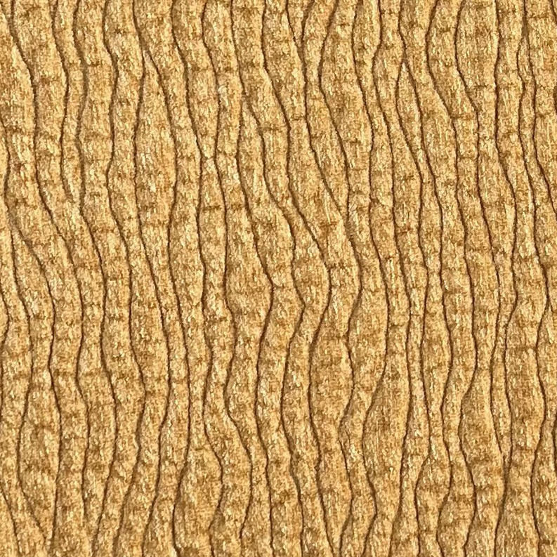 Yellow fabric close-up showing wavy desert-line textured pattern