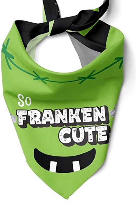 Green bandana bib with monster face print, 'Franken Cute' text, black neck tie