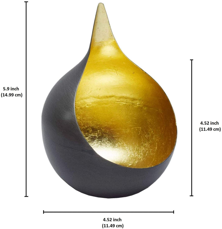 Gold and black teardrop tea-light candle holder with wide opening, dark base