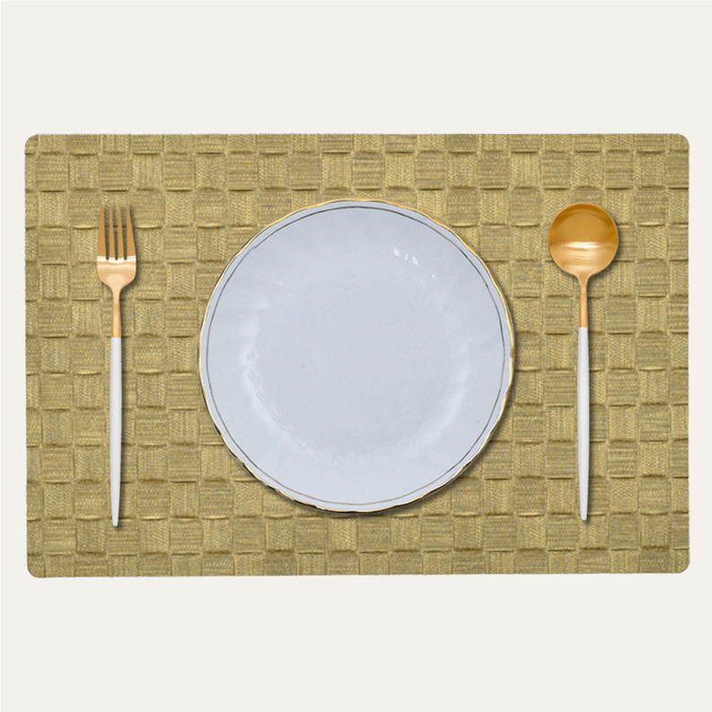 Gold PVC placemat with woven texture, rectangular with rounded corners