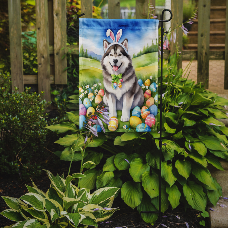 Alaskan Malamute Easter egg hunt garden flag showing dog with butterfly bow near eggs