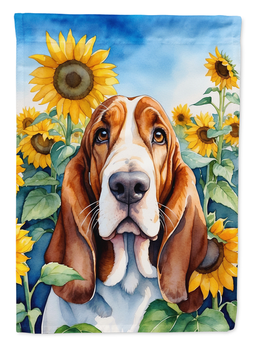 Basset hound garden flag close-up with brown dog, yellow sunflowers, and green leaves