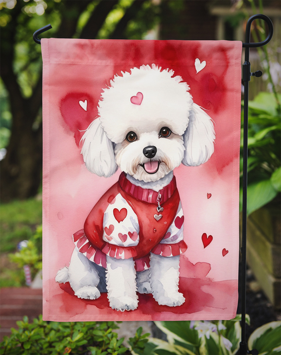 Red garden flag with white bichon frise wearing red bow tie and vest, hearts scattered