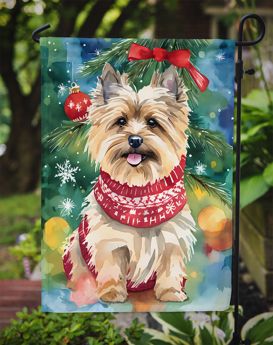 Christmas garden flag with Cairn terrier wearing a red knit sweater and bow