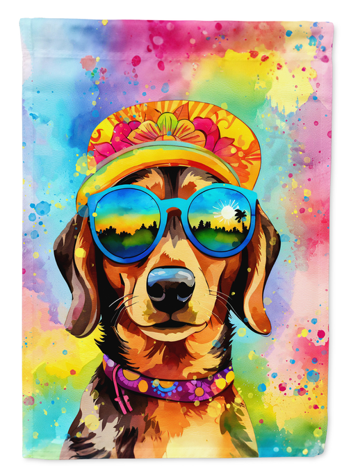 Dachshund garden flag close-up, dog wearing rainbow hat and sunglasses