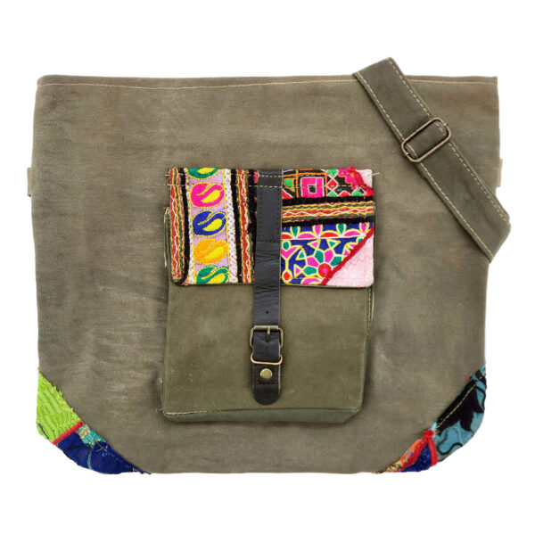 Earthtone crossbody bag with colorful embroidered patch front and shoulder strap
