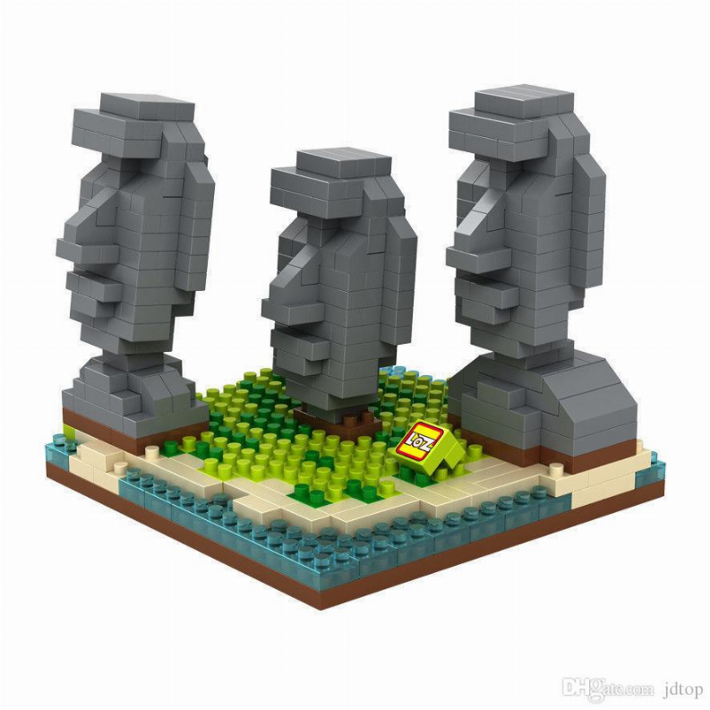 Three grey moai brick figures on green-tile island base