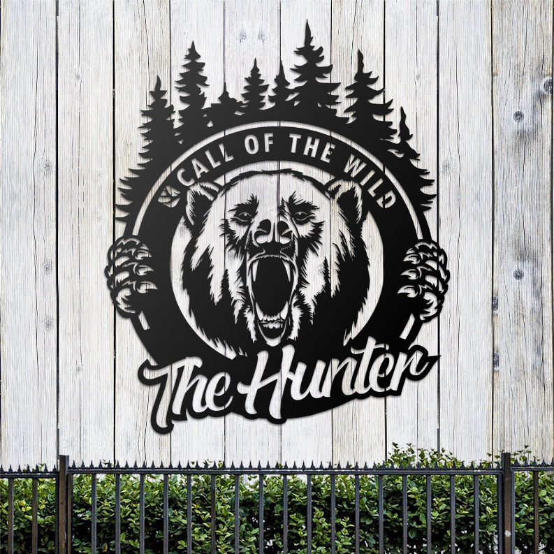 Metal wall art with roaring bear emblem on light wood siding