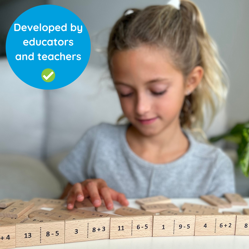 Wooden number domino tiles laid in a row for simple math addition and subtraction