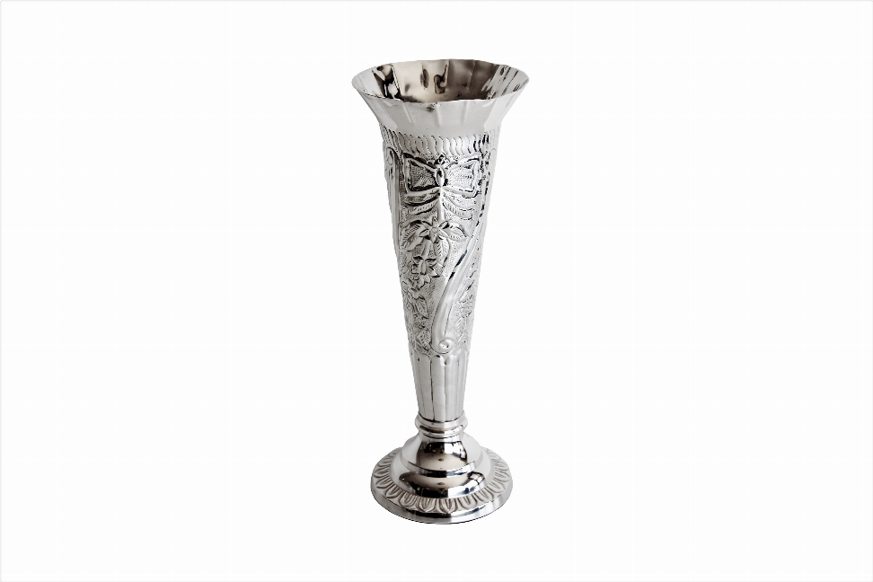 Embossed silver plate vase with flared rim and ornate relief pattern, pedestal base