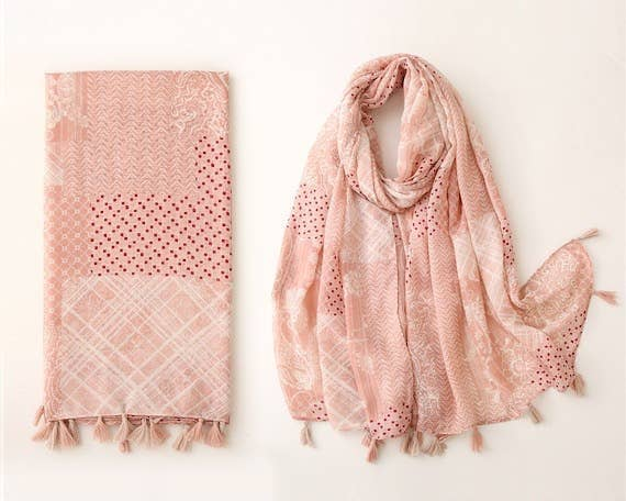 Long pastel pink voile scarf set with tassel fringe, folded and draped