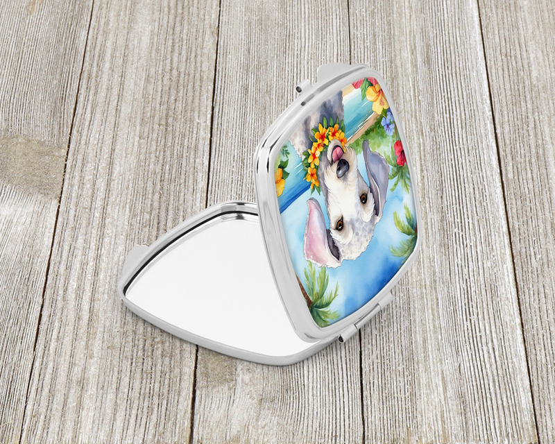 Silver compact mirror with colorful terrier portrait illustration on the side lid.