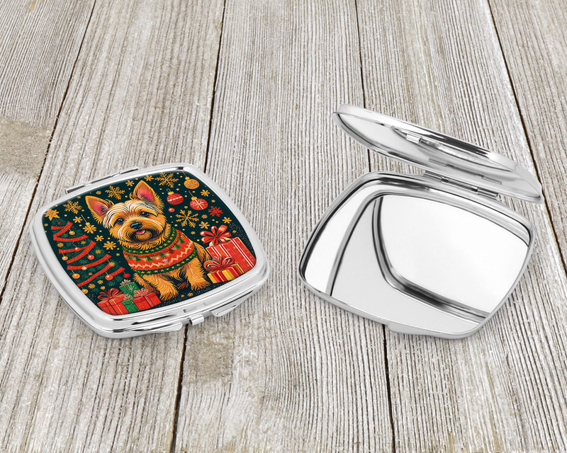 Silver compact mirror with holiday terrier design on one lid and back side closed