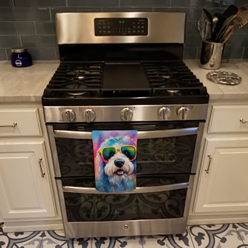 Hippie-dawg dog pot holder hanging on oven with colorful sunglasses and splatter design.