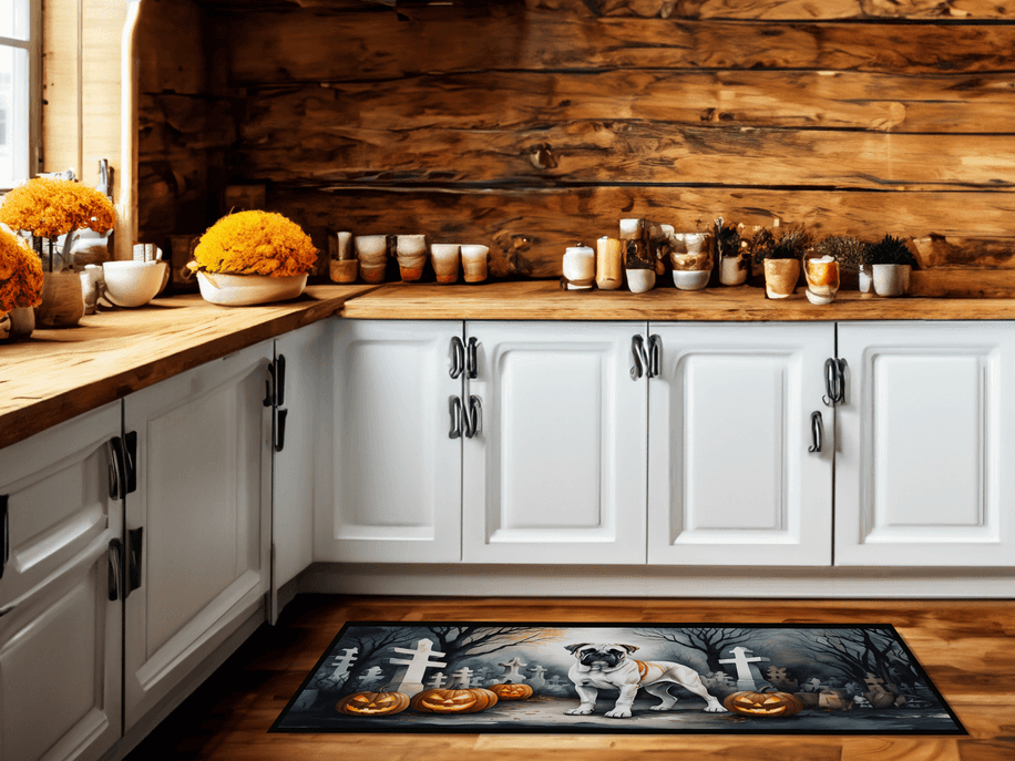 Colorful kitchen rug featuring a playful pug with pumpkins, set against a rustic wooden backdrop, perfect for Halloween decor.