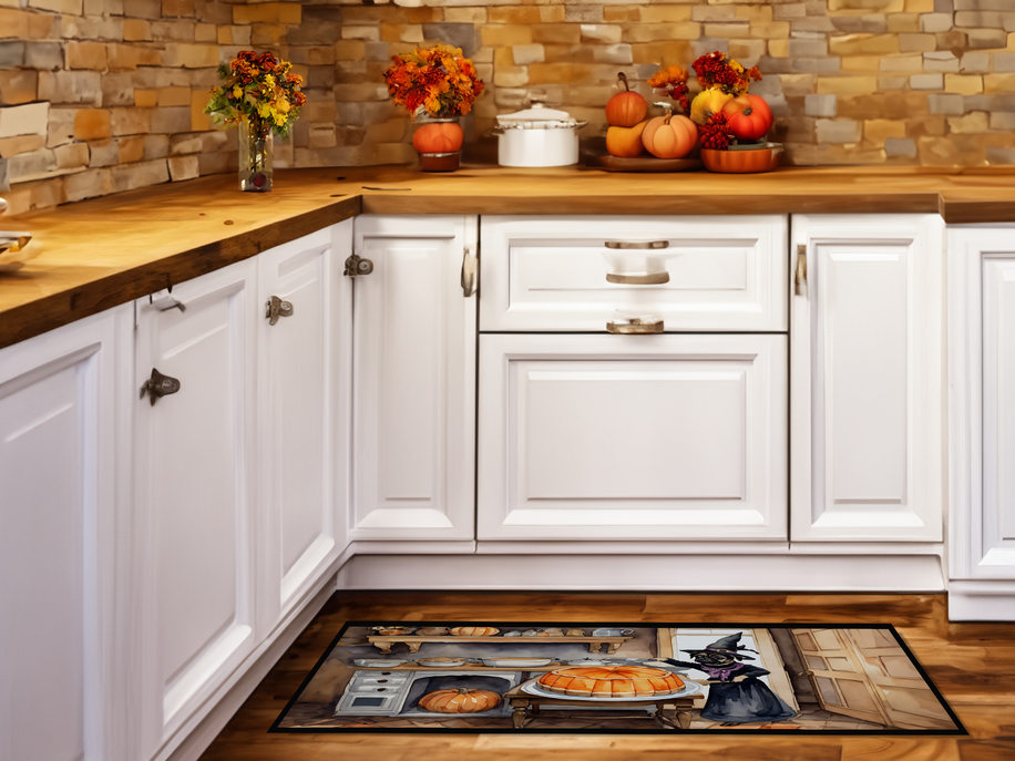 Fall kitchen mat with witch-cat and pumpkin artwork in a white cabinet kitchen