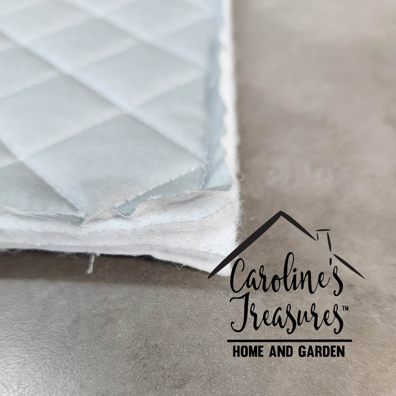 Quilted pot holder corner in light gray and white with stitched seam