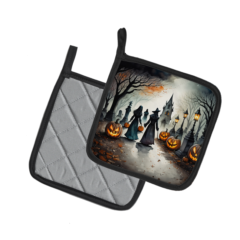Halloween pot holder pair: quilted gray with black trim and spooky pumpkin scene