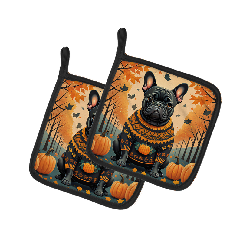 Pair of autumn dog print pot holders with black edging and orange pumpkin details