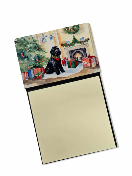 Decorative soy candle with beige sleeve and black-and-white dog Christmas scene