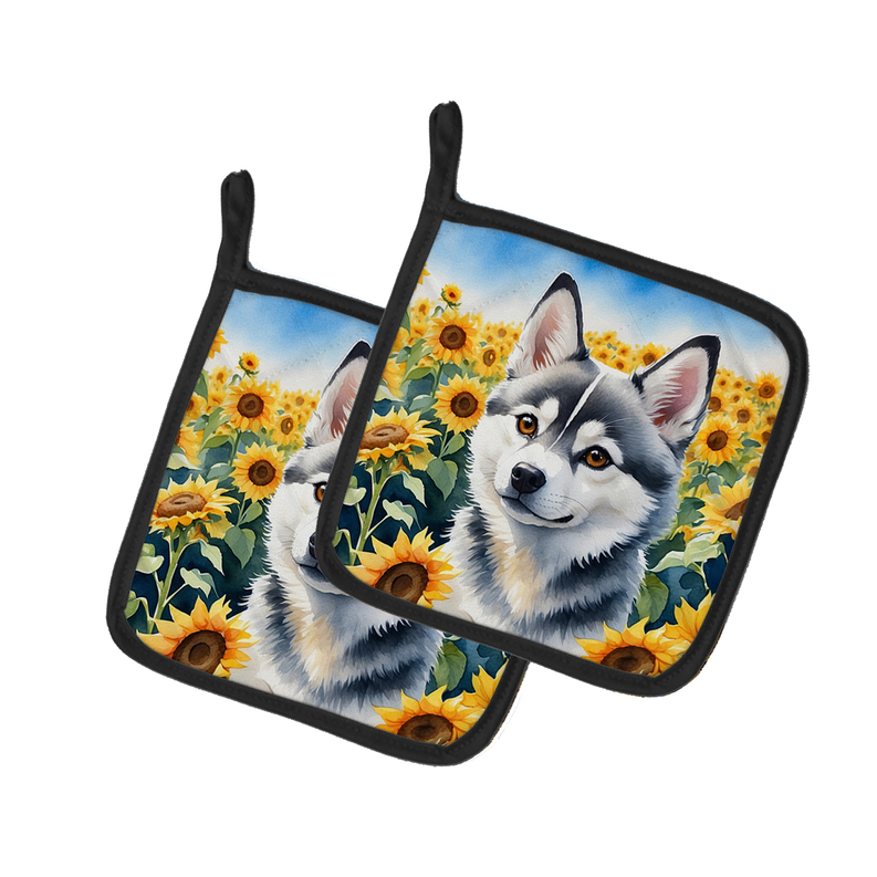 Pair of Alaskan Klee Kai pot holders with sunflowers and black-edged trim