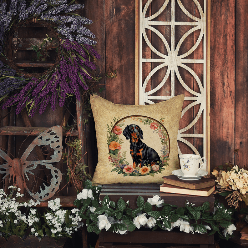 Black and brown Rottweiler decorative pillow on a rustic background with floral accents, ideal for pet lovers.
