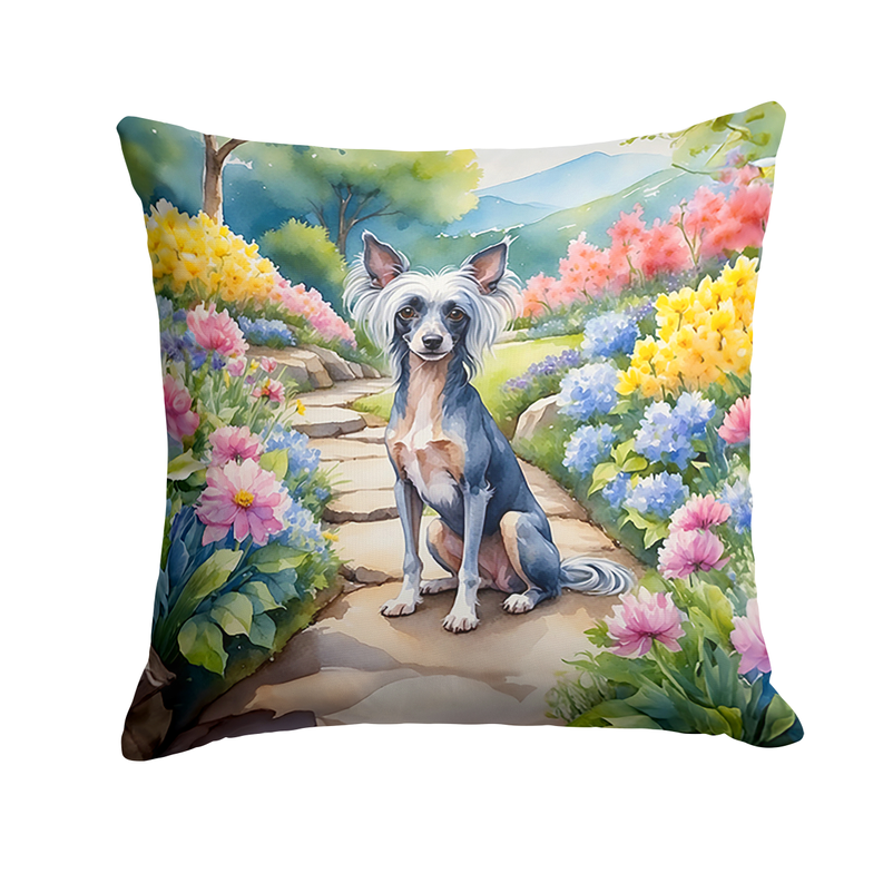 Square decorative pillow with light dog in a spring flower garden on a stone path