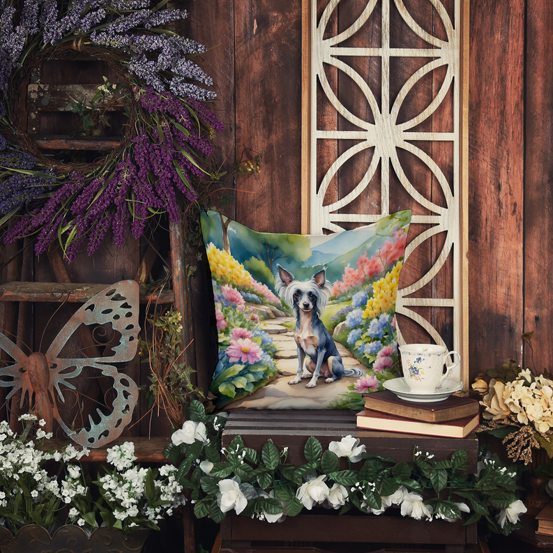 Square decorative pillow with light dog portrait in a spring flower landscape on stone path