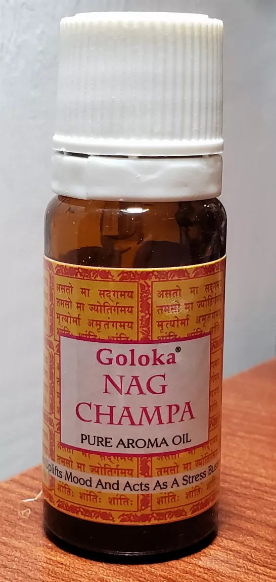 Goloka Nag Champa pure aroma oil bottle close-up