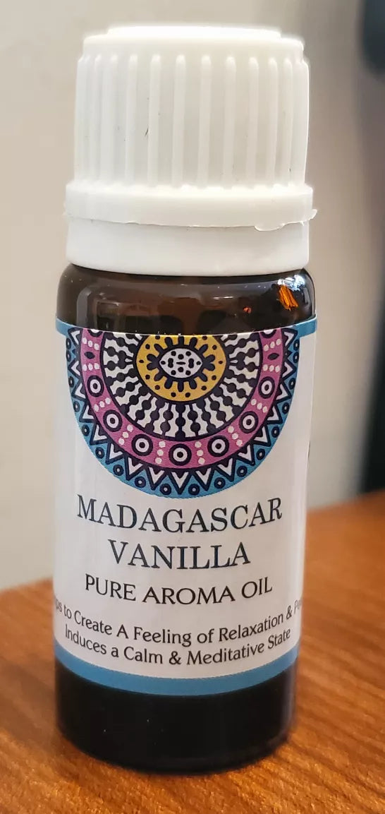 Madagascar Vanilla pure aroma oil bottle with colorful label, brown glass and white cap.