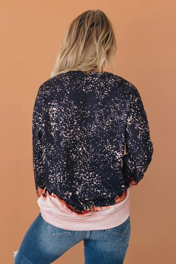 Bleached crewneck pullover, navy with white speckle splatter and pink lower band