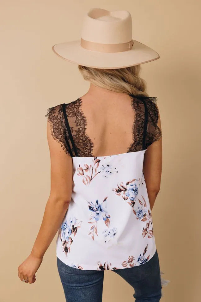 Lace-shoulder tank top with black lace upper back and white blue floral print