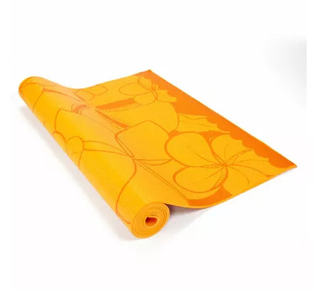 Yoga mat in orange with printed floral/line pattern and rolled strap edge