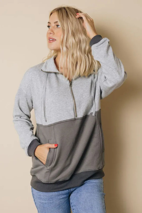 Colorblock sweatshirt with heather gray top, dark gray front, and quarter-zip