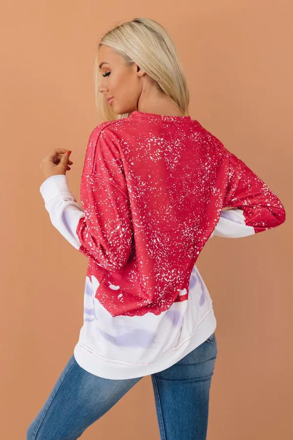 Red speckled bleached pullover sweatshirt with white sleeves, back view
