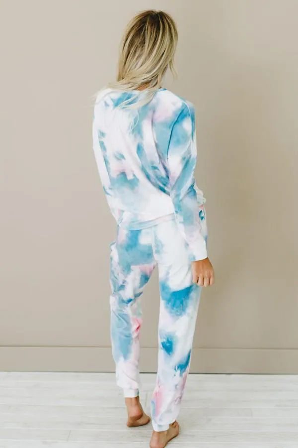 Tie-dye loungewear set, back view: long-sleeve sweatshirt and jogger pants with ankle cuffs
