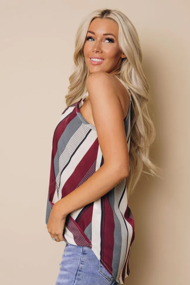 Striped draped tank angled view, sleeveless V-neck with maroon white gray stripes