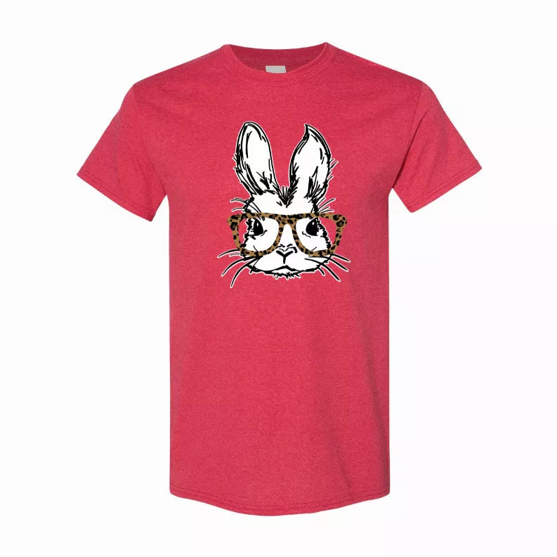 Red T-shirt with bunny face graphic wearing leopard-pattern glasses