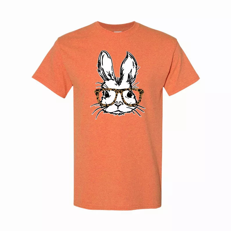 Orange crew-neck T-shirt with front bunny face graphic and leopard-print glasses