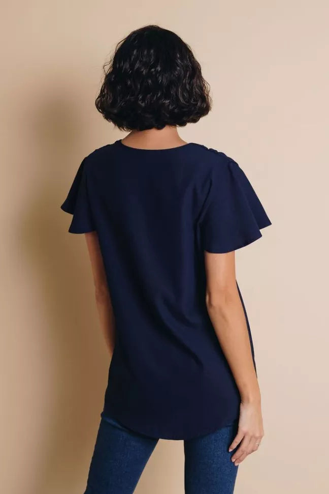 Navy V-neck short-sleeve top, back view with centered seam and straight hem