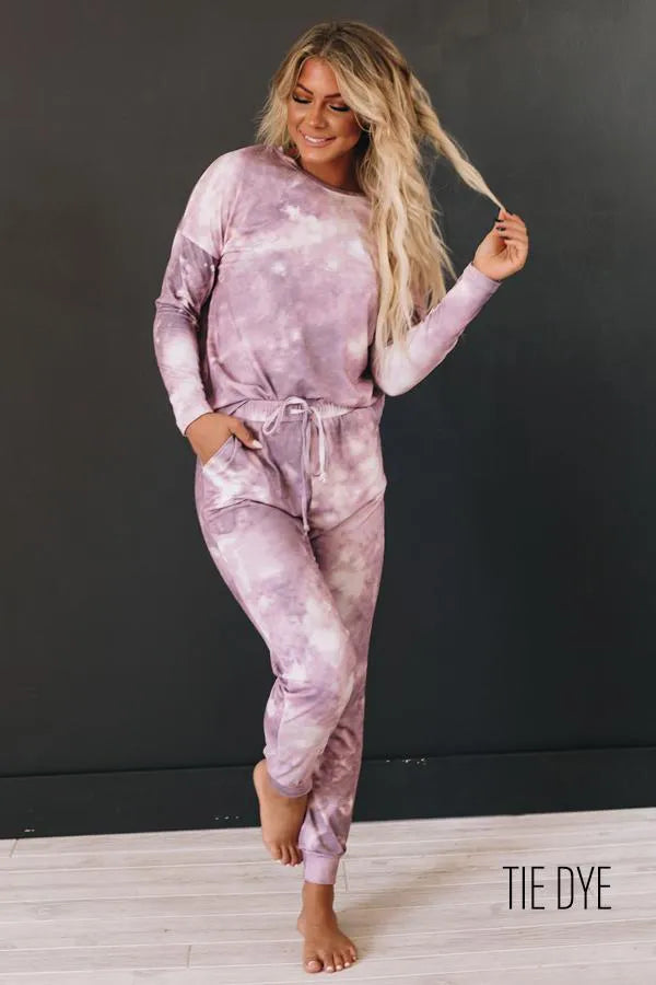 Pink tie-dye loungewear set with long-sleeve top and jogger pants, front view