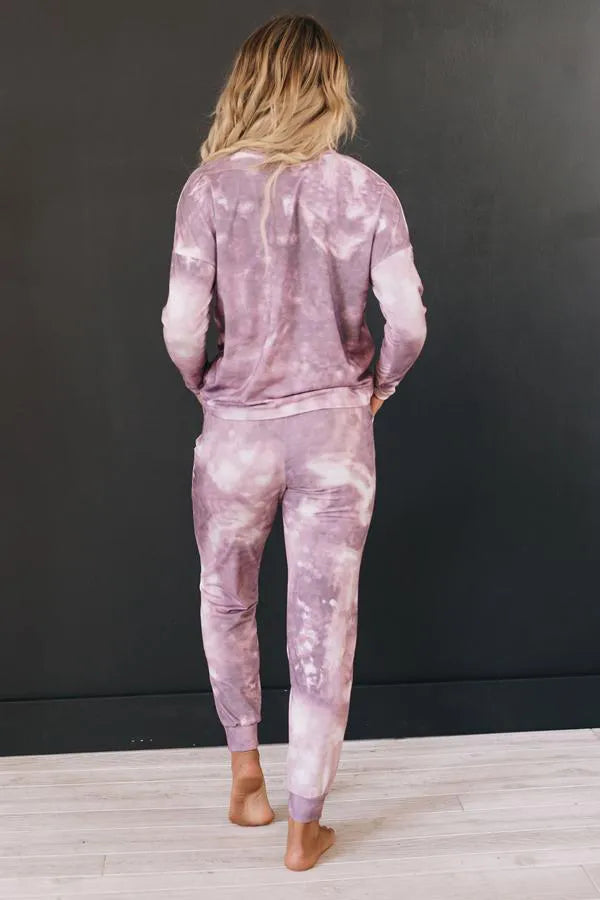 Pink tie-dye loungewear set with long-sleeve top and jogger pants, rear view
