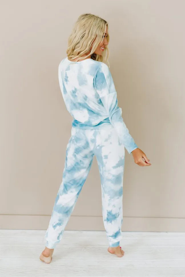 Mint-blue tie-dye jogger pants with pullover hoodie, back view