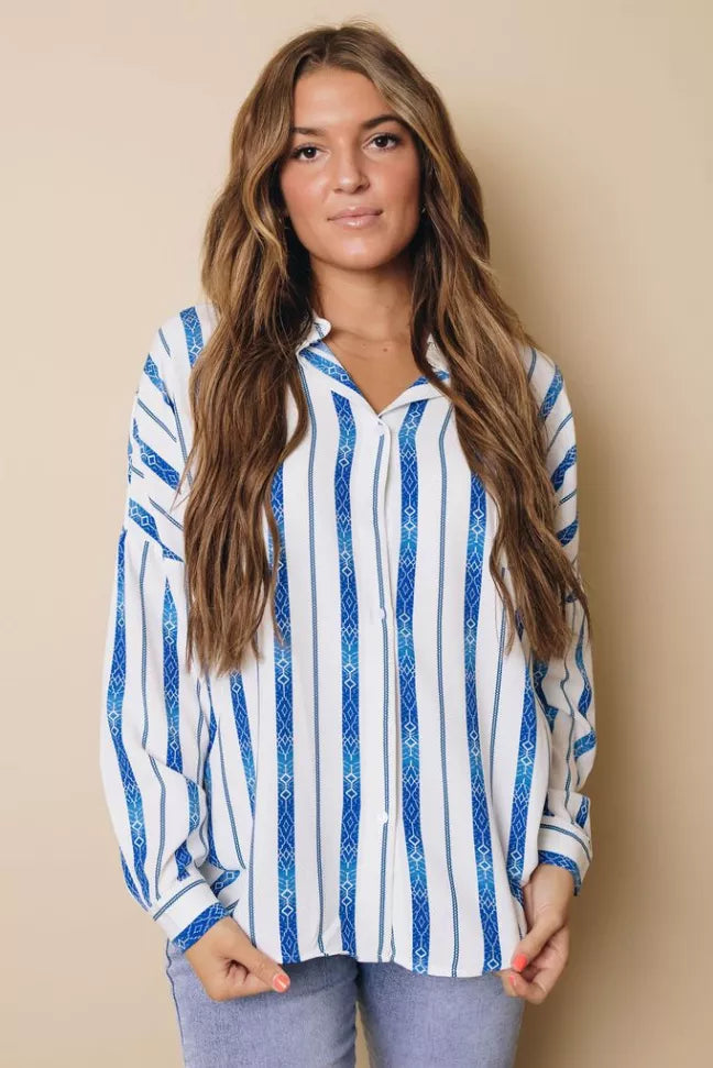Blue-and-white striped button-down shirt with open collar and long sleeves
