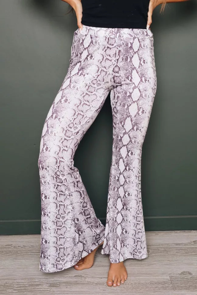 Purple snakeskin-print wide-leg pants, front view and ankle opening