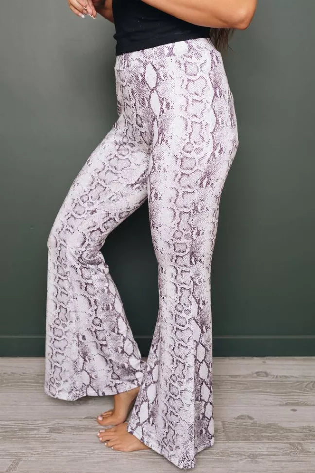 Purple snakeskin-print wide-leg pants with elastic waist, side view