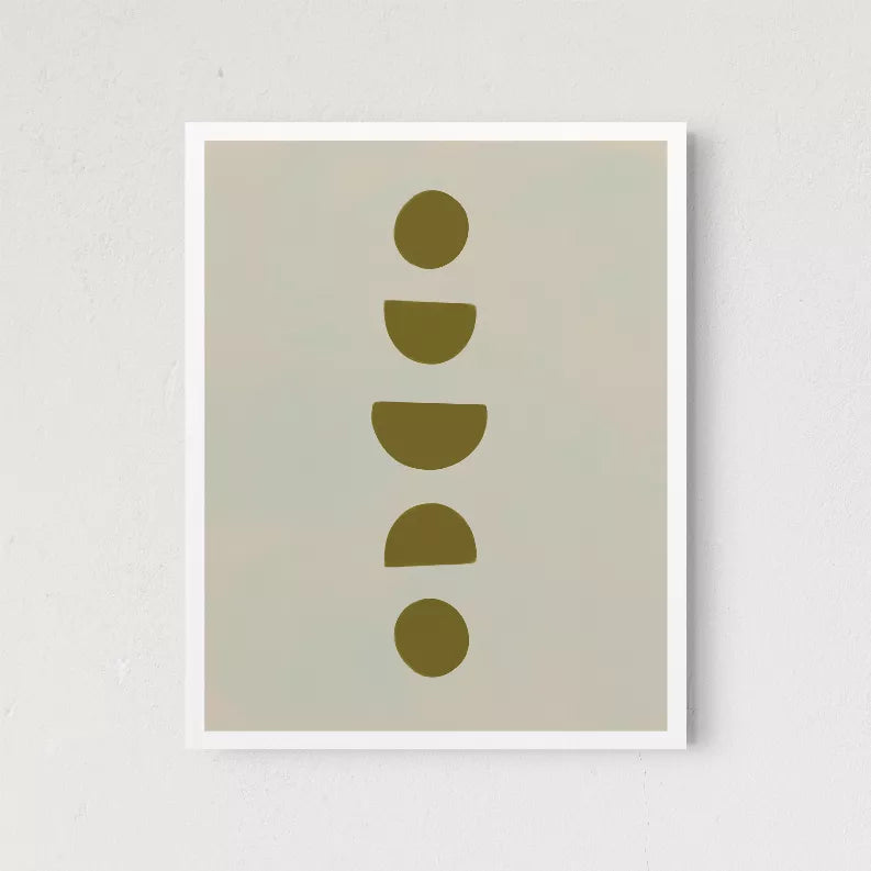 Framed wall art print with white border and vertical olive abstract discs and arcs