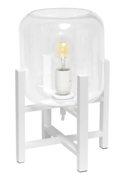 White wood table lamp with clear cylinder glass shade and Edison bulb on stand
